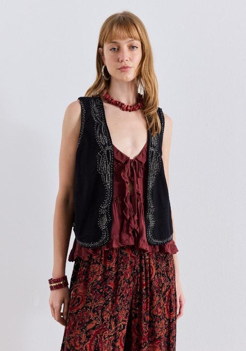 Blusa tipo gillet con bordados