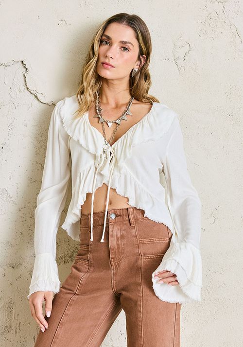 Blusa look fluido con volantes