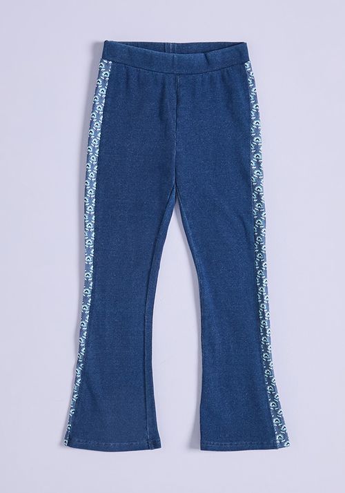 Calza Flare Look Denim con Estampados Laterales