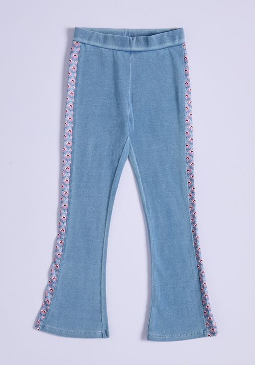Calza Flare Look Denim con Estampados Laterales