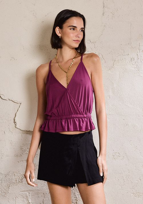 Polera estilo peplum con faldon