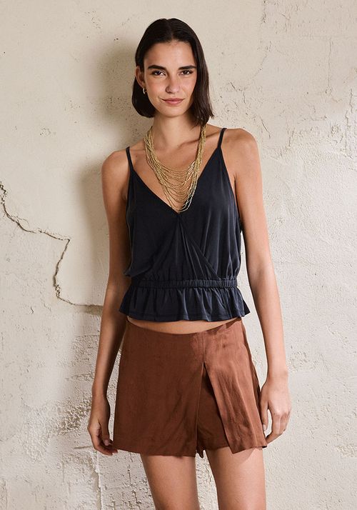 Polera estilo peplum con faldon